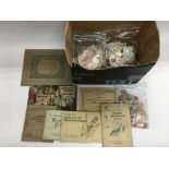 A collection of cigarette cards and stamps.