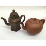 Two Chinese Yixing pottery teapots, one of hexagon