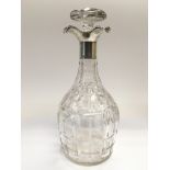 A silver collared glass decanter, Sheffield hallma