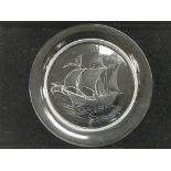 A Lalique plate depicting a sailing ship, diameter