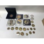 A box containing a collection of proof coins, comp