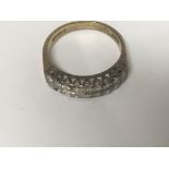 A 18 ct gold ring Inset with two rows of diamonds