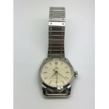 A circa 1950s Tudor Oyster watch with baton numera