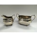 A silver milk jug and a silver sugar bowl, Birming