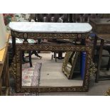 A marble top and mahogany console table with gilt