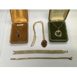 A small collection of gold tone jewellery includin