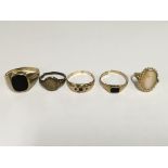 Five rings including 9 ct gold .