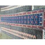Three hand knotted carpet runners two of Afghan ty