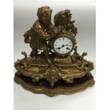 An 8 day giltwork figural mantle clock depicting a