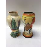 Two Clarice Cliff vases decorated with trees in colours of green brown and yellow 15 cm and 16 cm