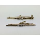 Two gold diamond bar brooches, approx 7.6g.