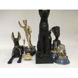 A collection of reproduction Egyptian figures.