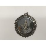 A silver and gem set framed miniature of Catherine