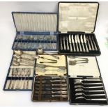 A silver handled, cased set of forks and knives pl