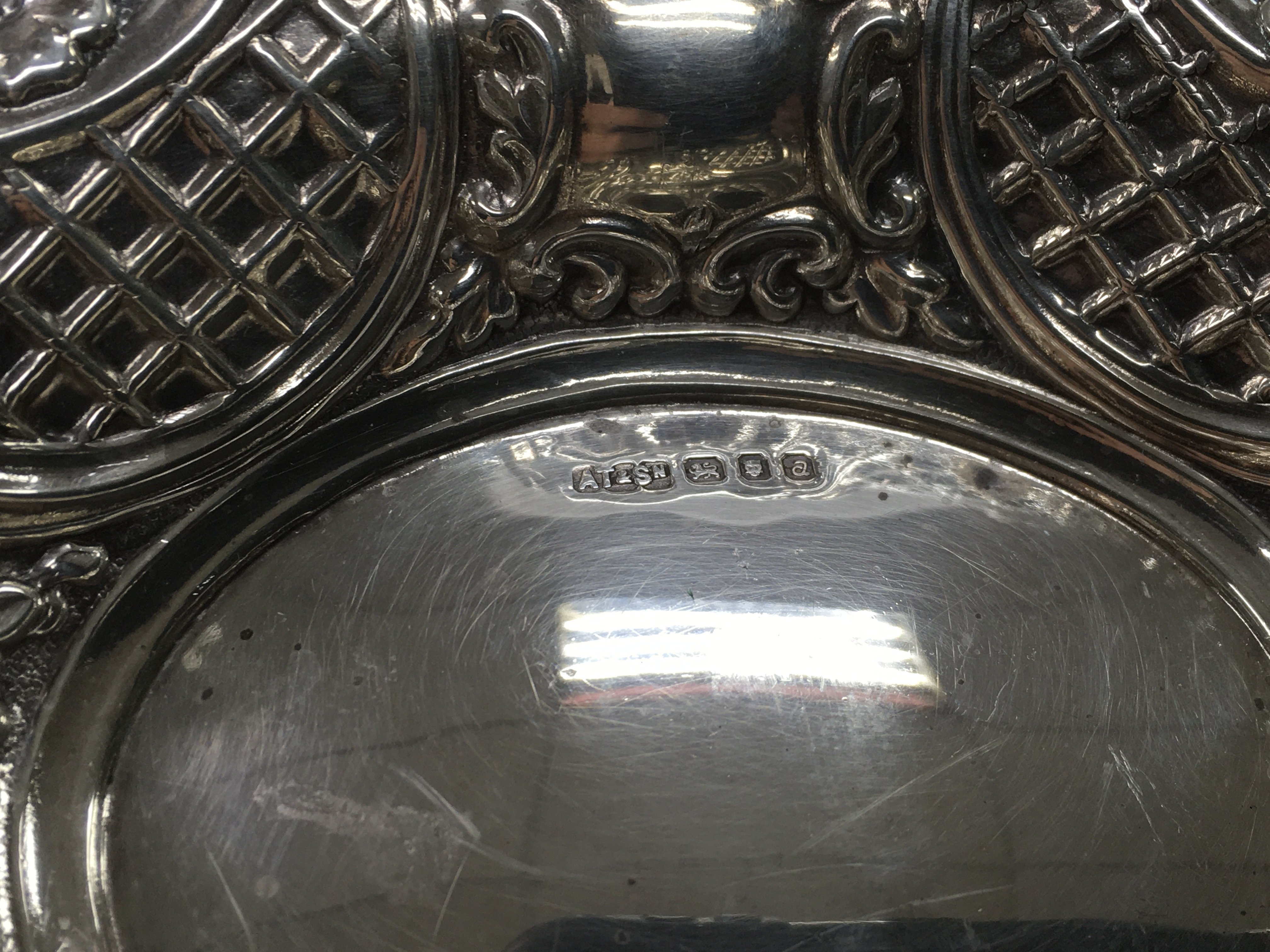 A silver dish with repousse work decoration, Londo - Image 2 of 2