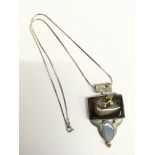 An unusual, contemporary modernist pendant necklac