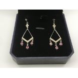A pair of white gold Art Deco style drop earrings,