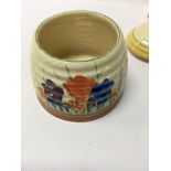 A Clarice cliff preserve pot decorated with crocus