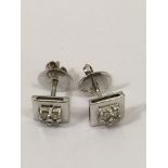 A pair of square shape white gold and diamond set stud earrings