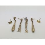 Three pairs of 9ct gold earrings, approx 2g.