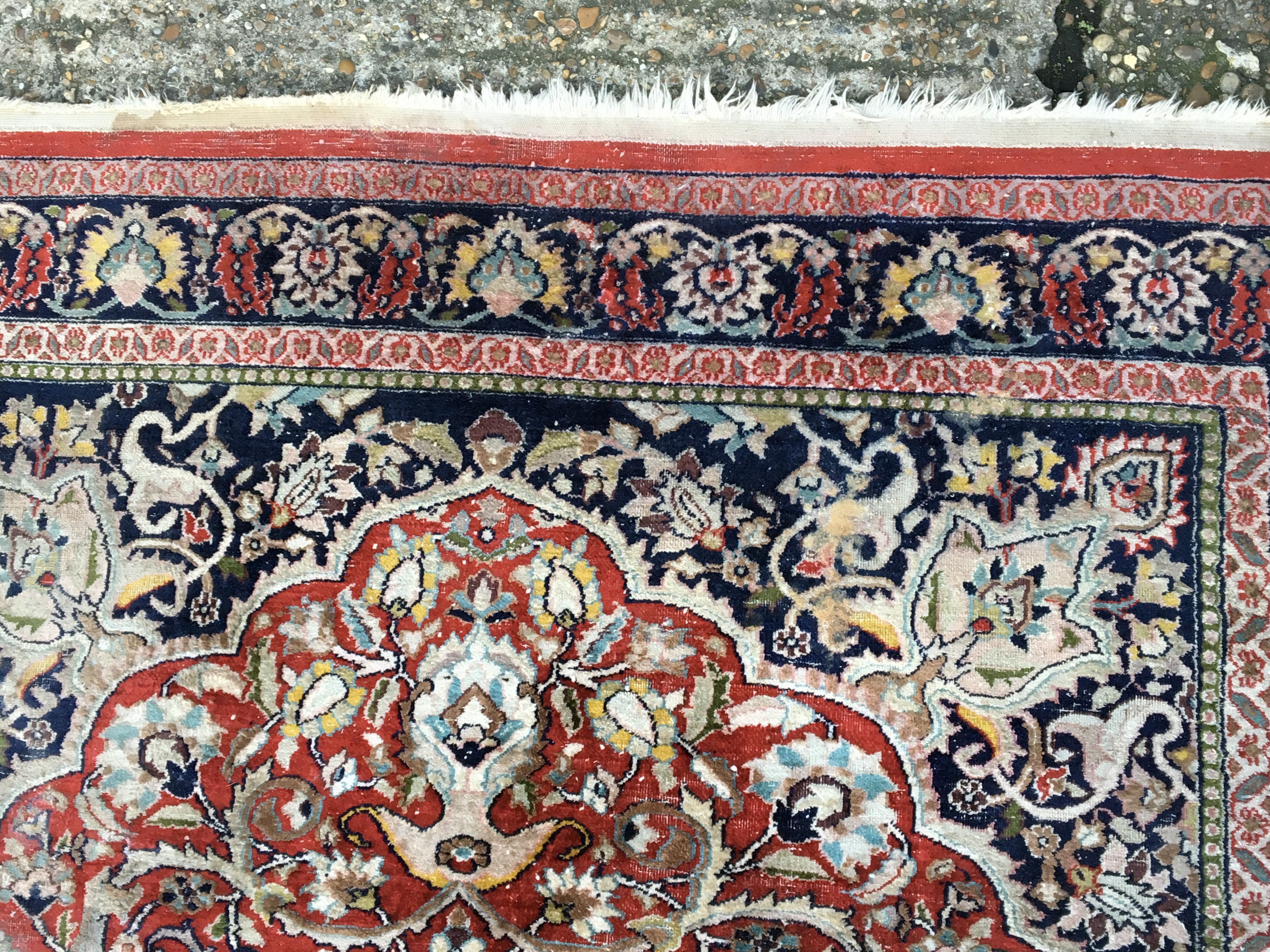 A Persian part silk hand knotted rug with a floral - Image 3 of 4