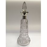 A silver collared glass decanter, Sheffield hallma
