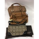 A Coach designer handbag with dustbag, a leather R