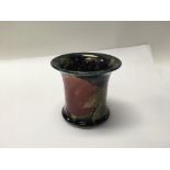 A Moorcroft pomegranate pattern vase. Height appro