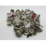 A silver charm bracelet, approx 156g.