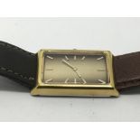A gents Roamer watch with squared dial and baton n