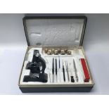 A boxed Skybolt students microscope laboratory kit