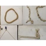 A collection of vintage gold plated jewellery.