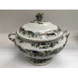 A 19th Century tureen decorated with hand painted