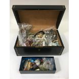 A jewellery box containing hardstone necklaces and