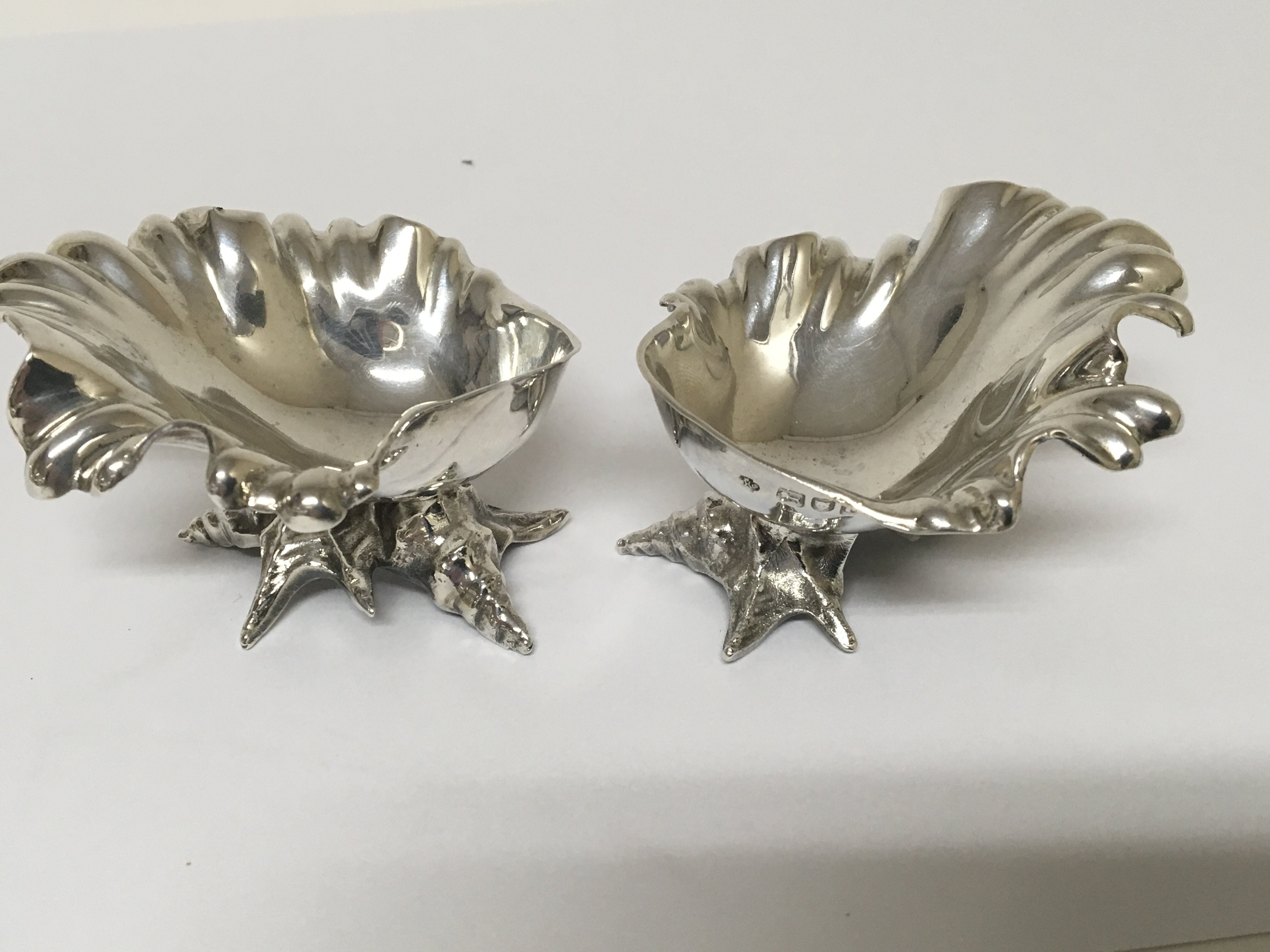 A pair of Rococo influence shell shapes silver sal - Image 2 of 3