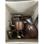 A collection of brass and copperware items.