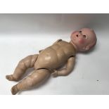 A German bisque headed doll, marked "AS Germany 26