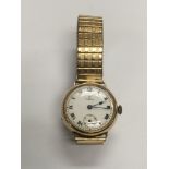 A vintage 9ct gold cased Omega watch Roman numeral