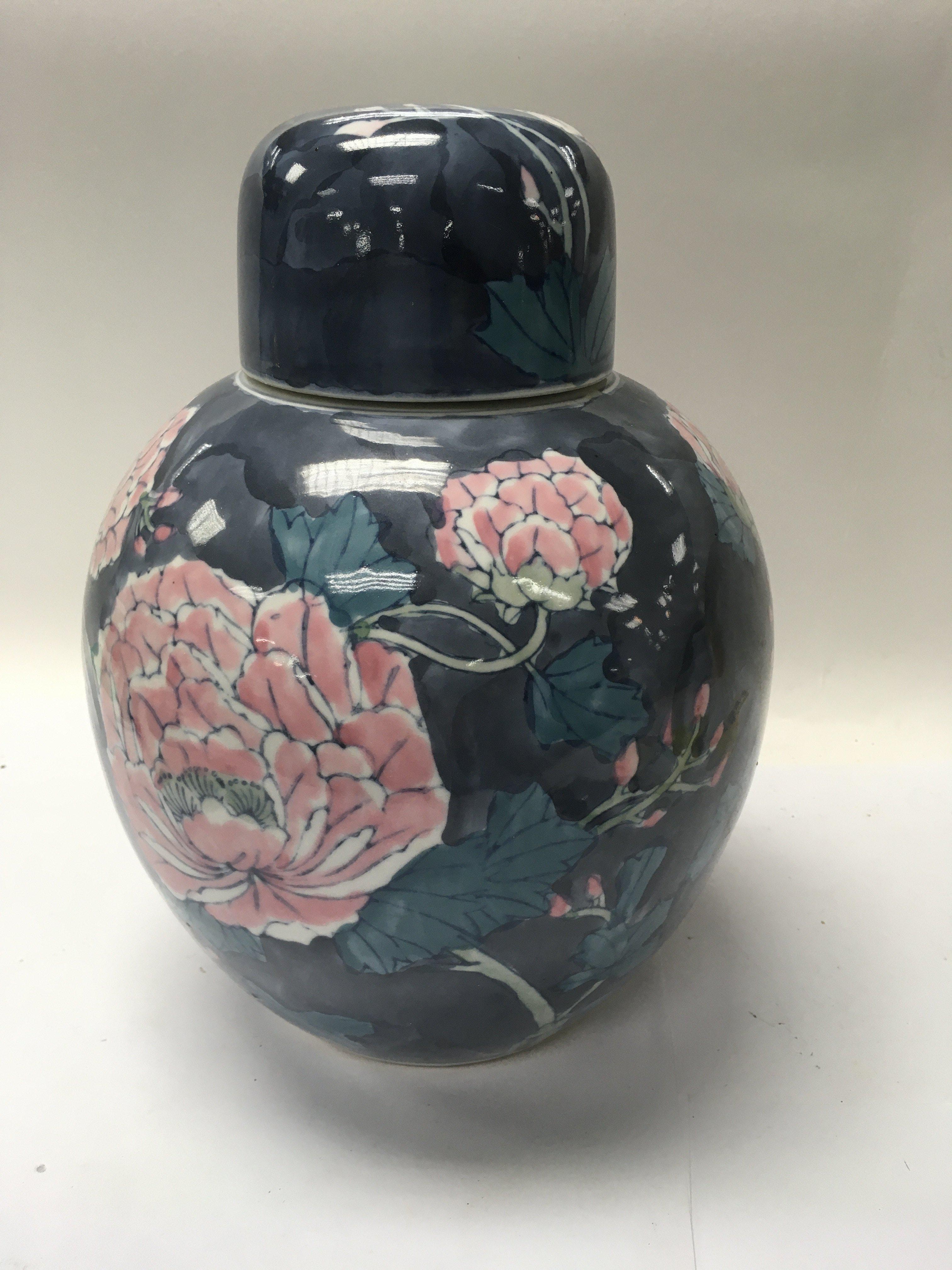 A Chinese style ginger jar and a collection of decorative plates