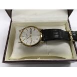 A boxed Gold Gents Rotary watch, the dial with