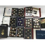 A collection of proof coin sets.