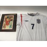 A signed framed photo of David Beckham and an Engl