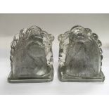 A pair of glass horse head ornaments, approx heigh