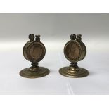 A pair of two World War I penny trench art lighter