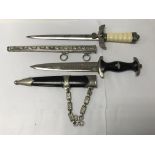 A pair of replica German WW2 dagger to include a L