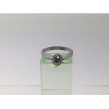 An 18ct white gold diamond solitaire ring, approx