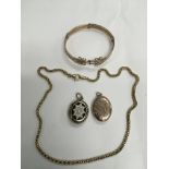 Two Victorian lockets and other yellow metal jewel