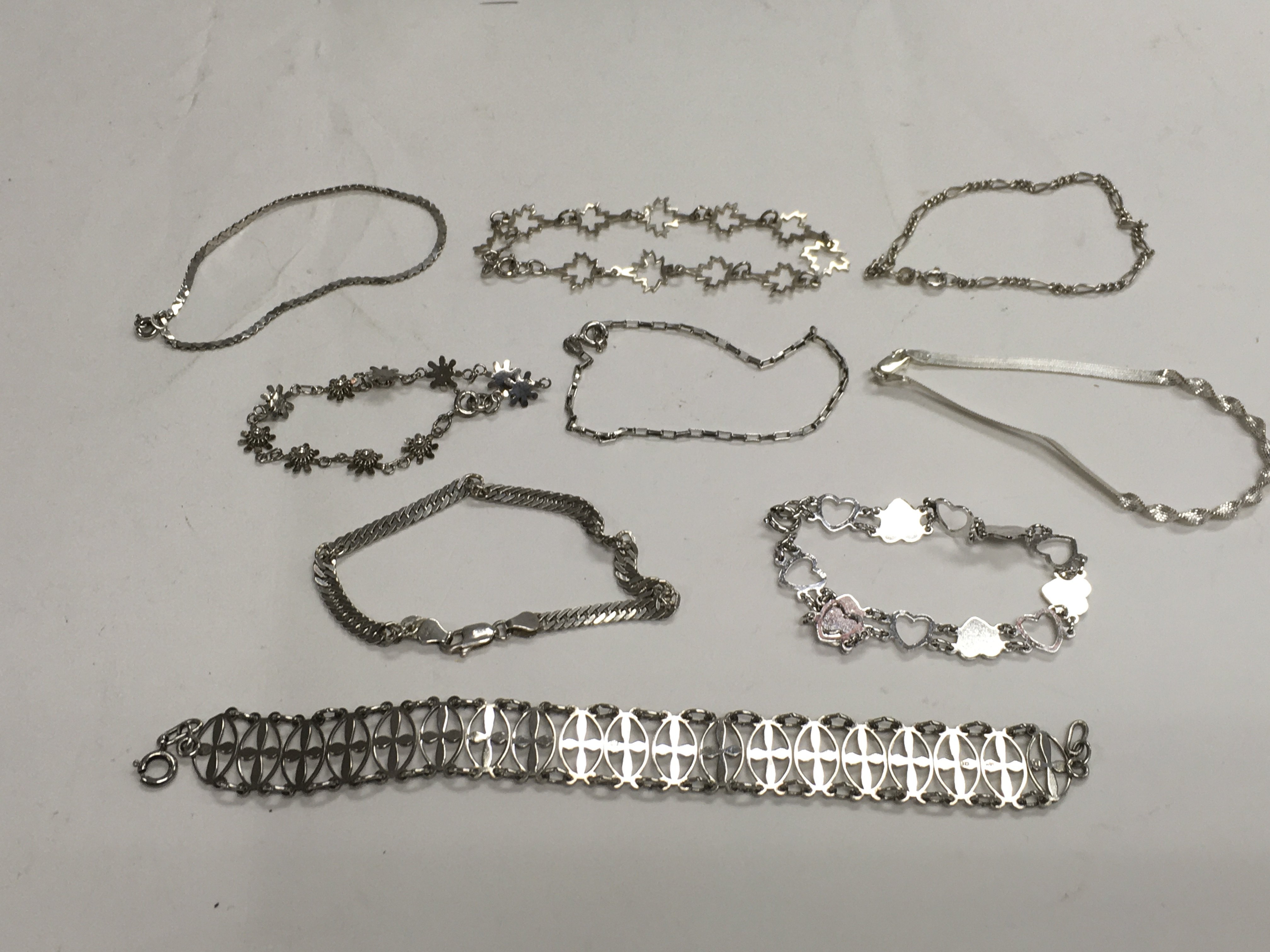 A small box of silver bracelets.