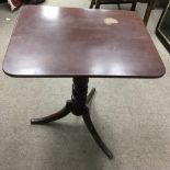 A small, 19th century mahogany tilt top occasional