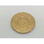 WITHDRAWN: A gold 1898 20 marks coin, approx 4g.